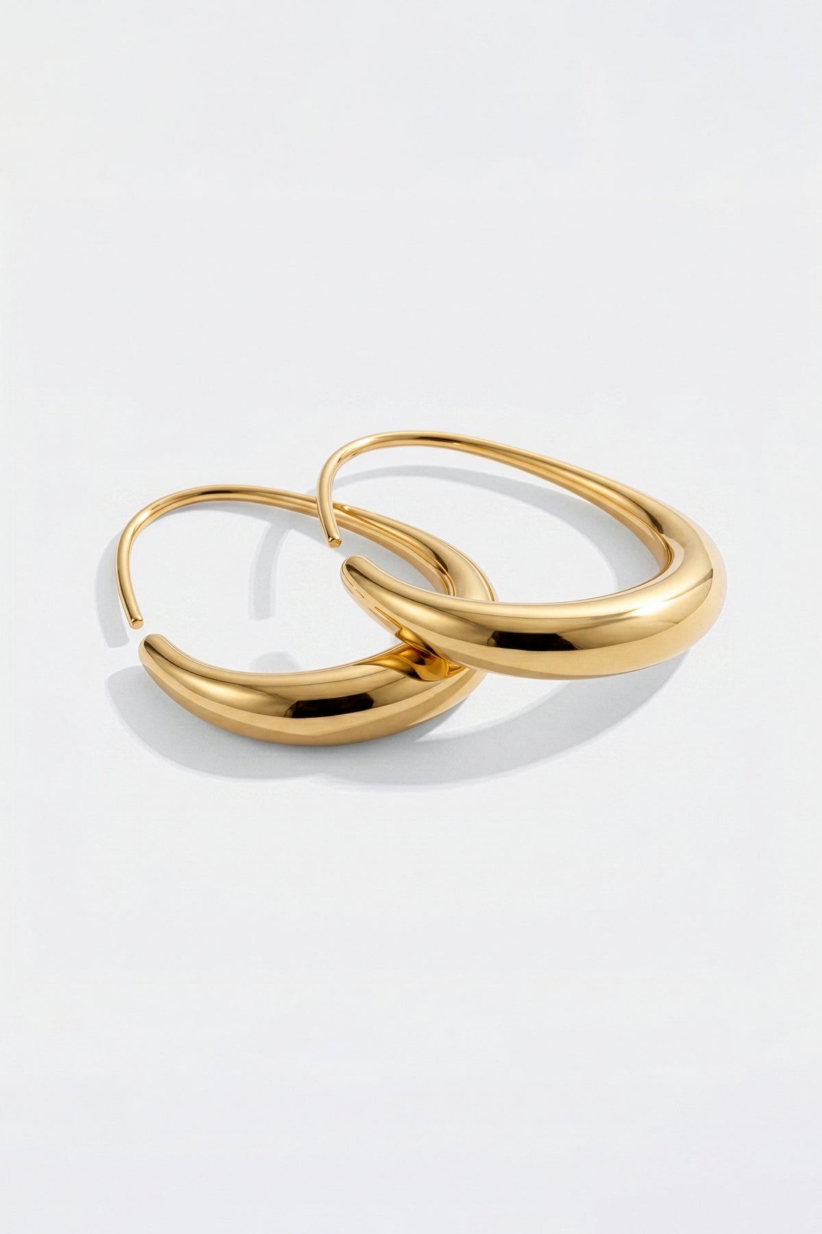 stylehess Fluid Hoop Earrings with Polished Finish - detail